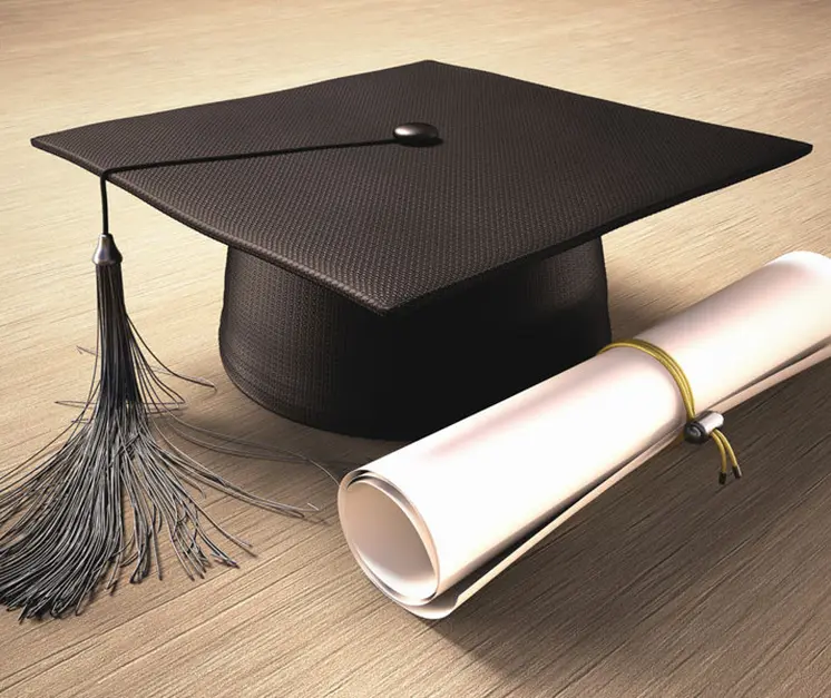 Graduates holding diplomas